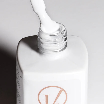 opened white gel nail polish bottle